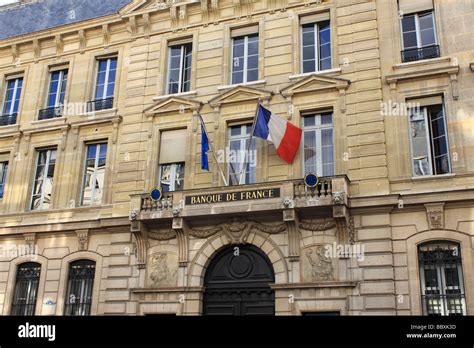 Façade of Banque de France buildings in Paris flying the Tricolour ...