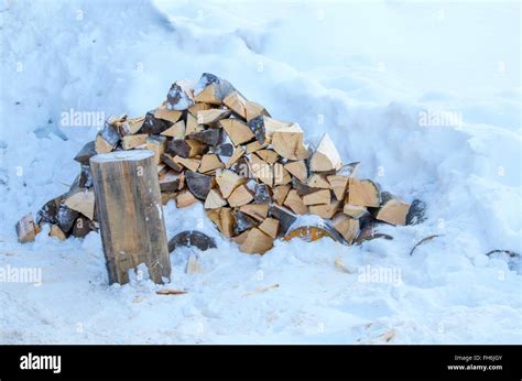 Firewood With Snow Hi Res Stock Photography And Images Alamy