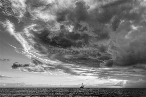 Sunset Sailboat Storm Looming Ocean Clouds Black and White Stock Image ...