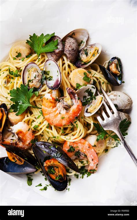 Seafood Pasta Spaghetti With Clams Prawns Sea Scallops On White