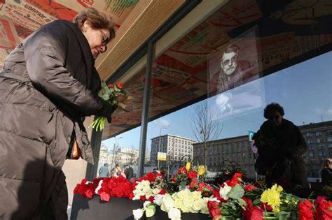 RUSSIA MOSCOW MARCH 16 2024 A Man Lays Flowers In Memory Of