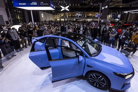 China Ev War Xpeng Expects Sales To Rev Up As It Snaps At Teslas