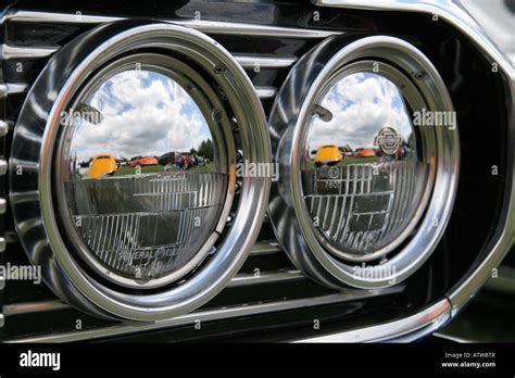 Headlamp On A Hot Rod Classic Car Chevrolet With Other Classic Hot Rod Cars And Blue Sky