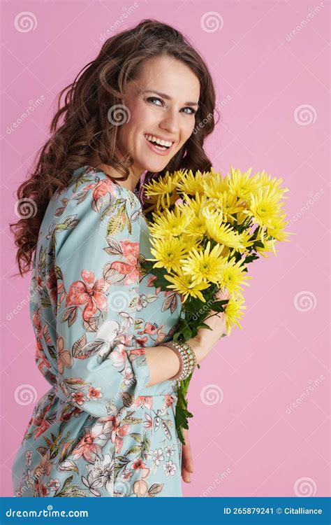 Portrait Of Happy Stylish Woman In Floral Dress On Pink Stock Image