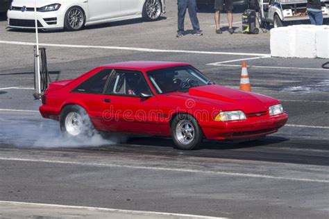 Red Mustang On The Track Making Burnout Editorial Image Image Of