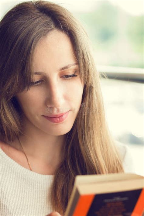 Young Beautiful Woman Reading A Book Stock Photo Image Of Cheerful