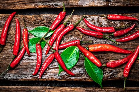 premium photo chili peppers   table