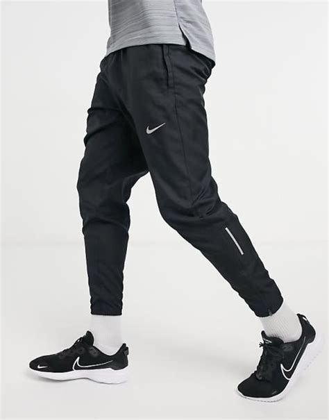 Nike Running Woven Joggers In Black Asos