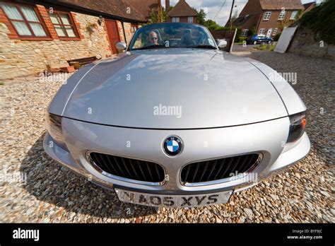 Open Top Metallic Silver Bmw Z4 Personal Luxury Rear Wheel Drive Sports