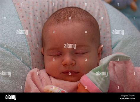 Newborn Baby Girl Sleeping On A Cushion Stock Photo Alamy