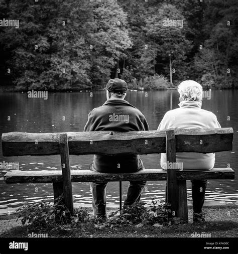 Old couple bench Black and White Stock Photos & Images - Alamy