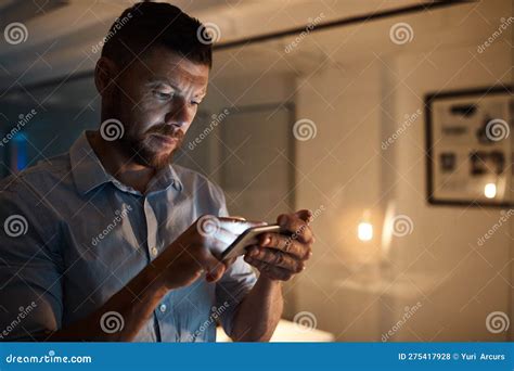Hes Got Work Saved Onto Every Device A Mature Businessman Using A