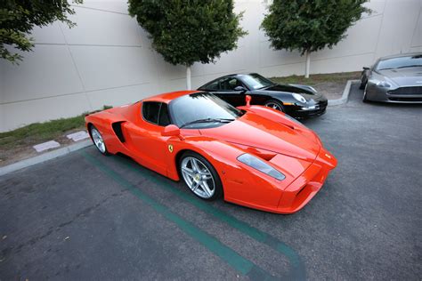 The world's only orange Ferrari Enzo. : r/carporn