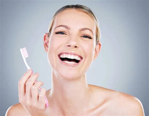 Studio Portrait Attractive Mature Woman Brushing Her Teeth Grey Background Stock Photo By