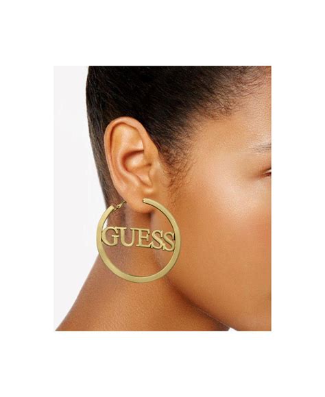 Guess Logo 2 1 4 Hoop Earrings In Gold Metallic Lyst