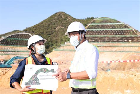 The Sdev Mr Michael Wong Right Is Briefed By Engineer Of The North