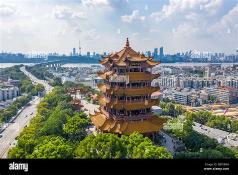 The yellow crane tower , located on snake hill in Wuhan, is one of the ...