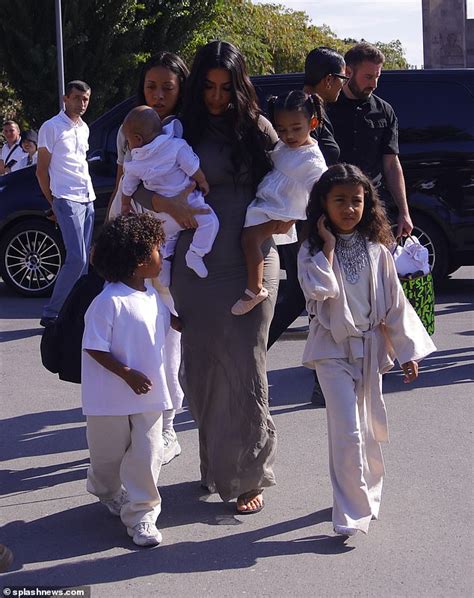 Kim Kardashian Shares Photos Of Saint Psalm And Chicago Baptisms