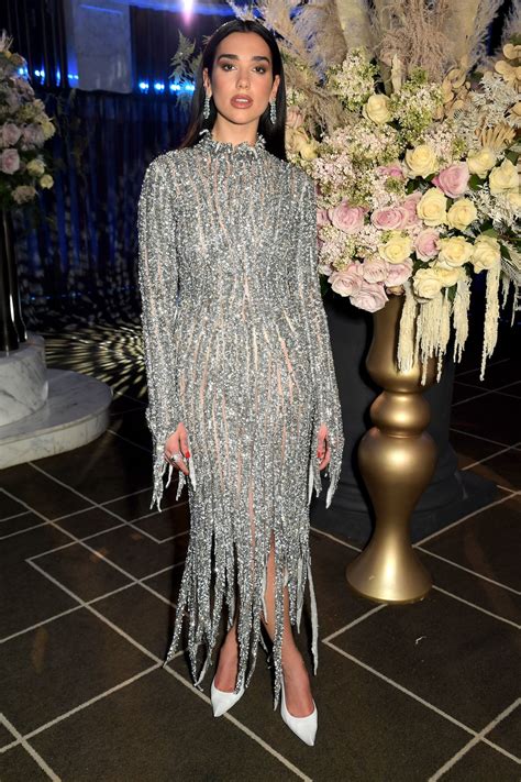 Dua Lipa Wore A Silver Balenciaga Dress For Her 2021 Oscars Party Performance