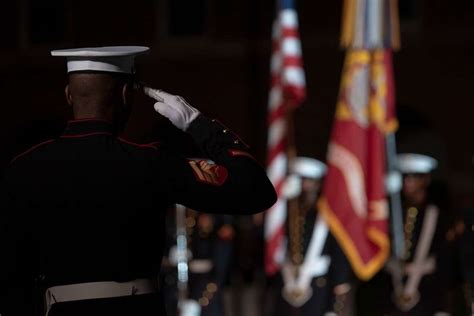 A U S Marine Renders Honors As The Colors Are Presented NARA DVIDS