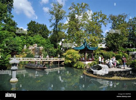 Temple And Pond In The Chinese Garden At The Theme Park Pairi Daiza