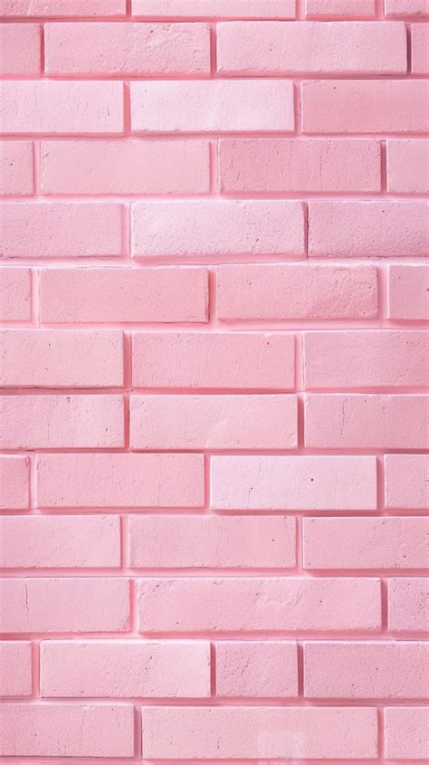 A Pink Brick Wall Is Shown In This Image