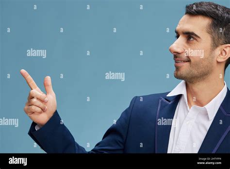 Cheerful Man On Suit Look Aside Pointing Finger Up Successful Career