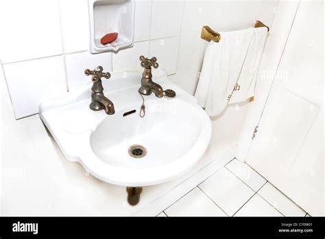 A Washbasin With Two Taps Hot And Cold Stock Photo Alamy