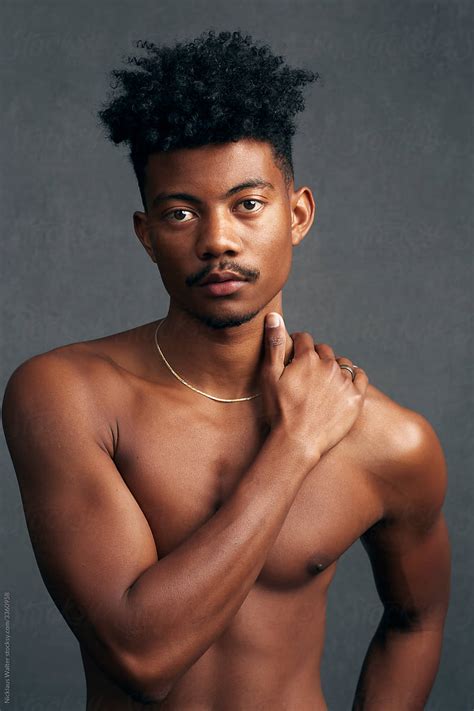 A Handsome Kenyan Filipino Man Shirtless In Studio By Stocksy