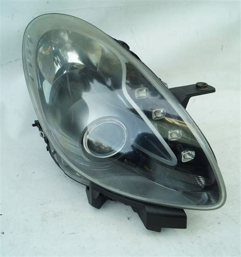 LAMPA REFLEKTOR PRAWY ALFA ROMEO GIULIETTA CIEMNY 11543717937