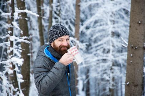 Premium Photo Portrait Of Mature Man Drinking Coffee While Standing