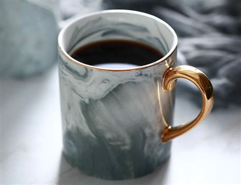 This Gold Rimmed Marble Coffee Mug Adds Splendor To Your Morning