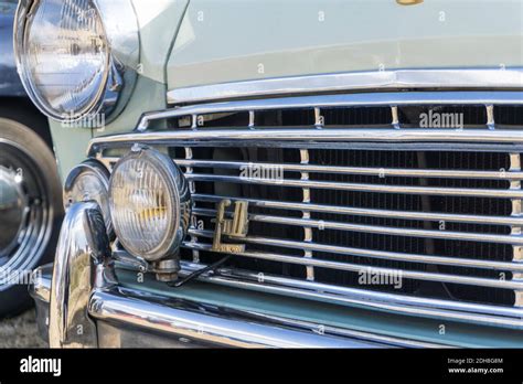 Close Up Detail Of The Chrome Front Grille And Headlights On A 1962