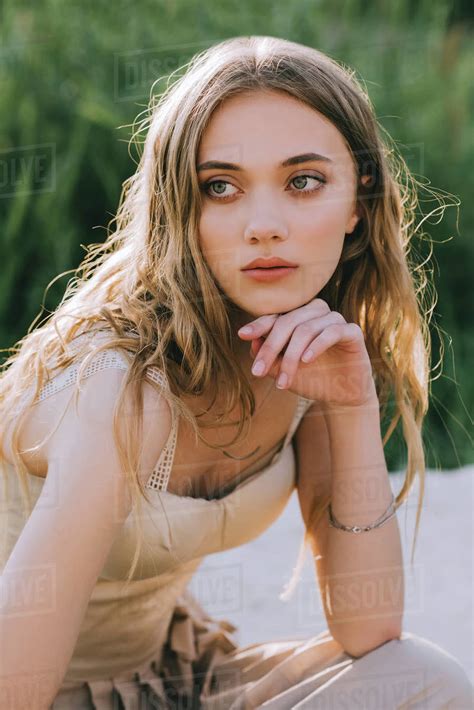 Portrait Of Attractive Blonde Girl In Elegant Dress Stock Photo