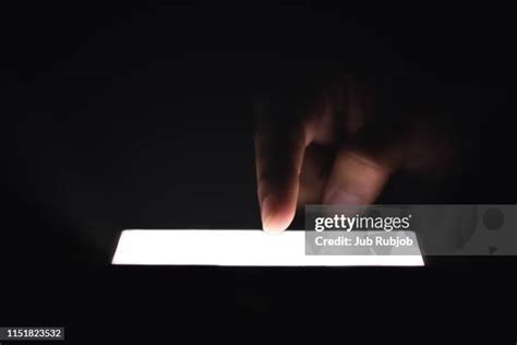 Hand Holding Phone Sideways Photos And Premium High Res Pictures