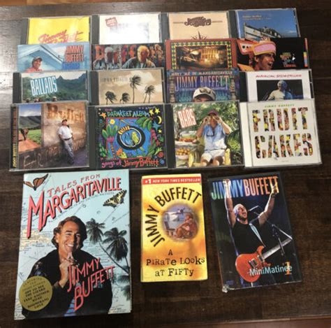 Jimmy Buffett CD Lot Jimmy Buffett collection 16 CD's. 2 books and DVD ...