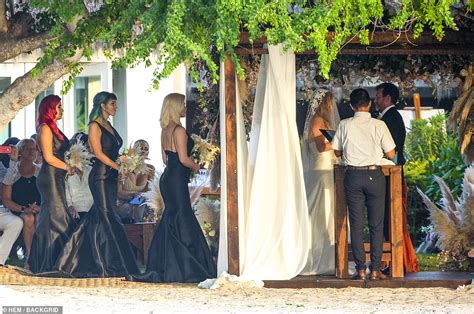 Bella Thorne Puts On A Cheeky Display In Bikini Before Changing Into Plunging Bridesmaid Gown