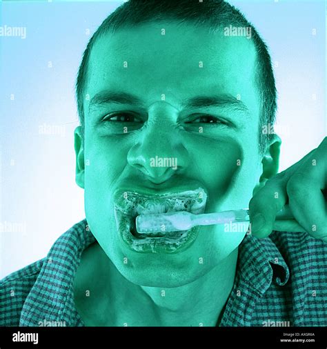 Man Brushing His Teeth Stock Photo Alamy