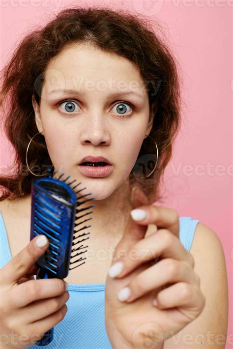 Beautiful Woman In Blue T Shirts Comb With Hair Emotions Pink Color