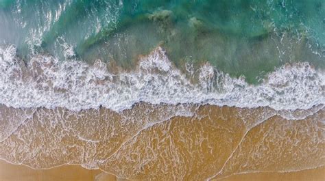 Vue De Dessus Du Ciel De La Mer Vague Et Paysage De Plage De Sable