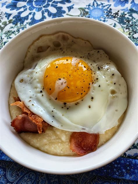 Cheesy Grits With Bacon And A Fried Egg Dippy Eggs Creamy Grits Protein Bowls Bacon Egg Big