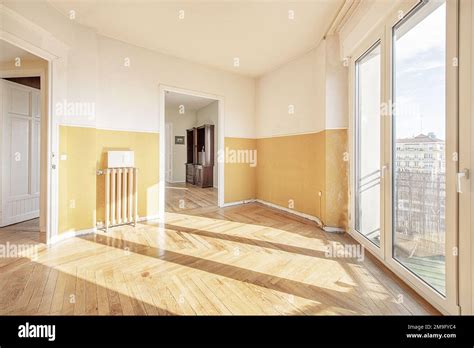 Empty Room With Varnished Vintage Wooden Floors Large Windows With