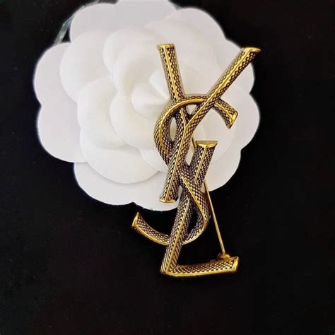 Yves Saint Laurent Брошь - купить с доставкой по выгодным ценам в ...