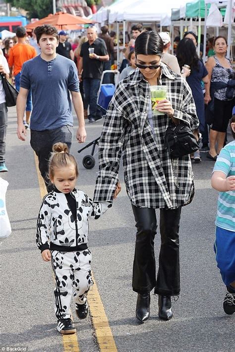 Kourtney Kardashian Dons Oversized Plaid Top For Outing With Son Reign