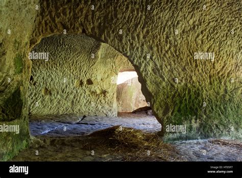 Etruscan tufa caves in Pitigliano Stock Photo - Alamy