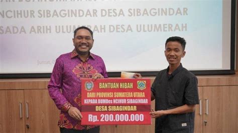 Pesan Bupati Franc Tumanggor Saat Serahkan Dana Hibah BUMDesa Tribun