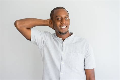 Free Photo Shy Handsome African American Guy Scratching Back Of Head