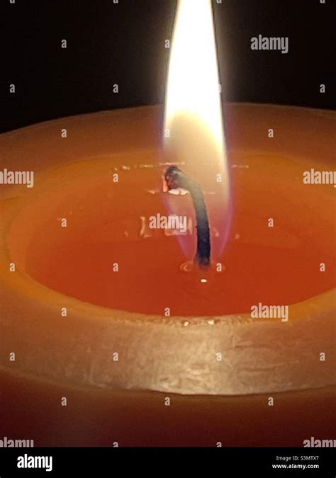 Burning candle flame close up Stock Photo - Alamy