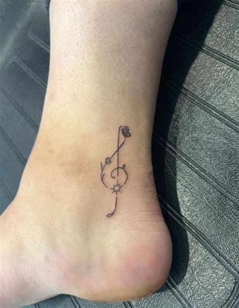 20 Amazing Musical Notes Tattoos Designs With Meanings Ideas And