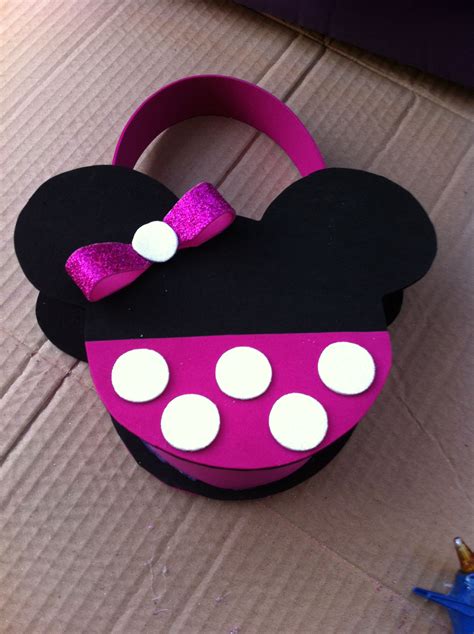 A Cardboard Box That Has A Minnie Mouse Head On It With Polka Dots And